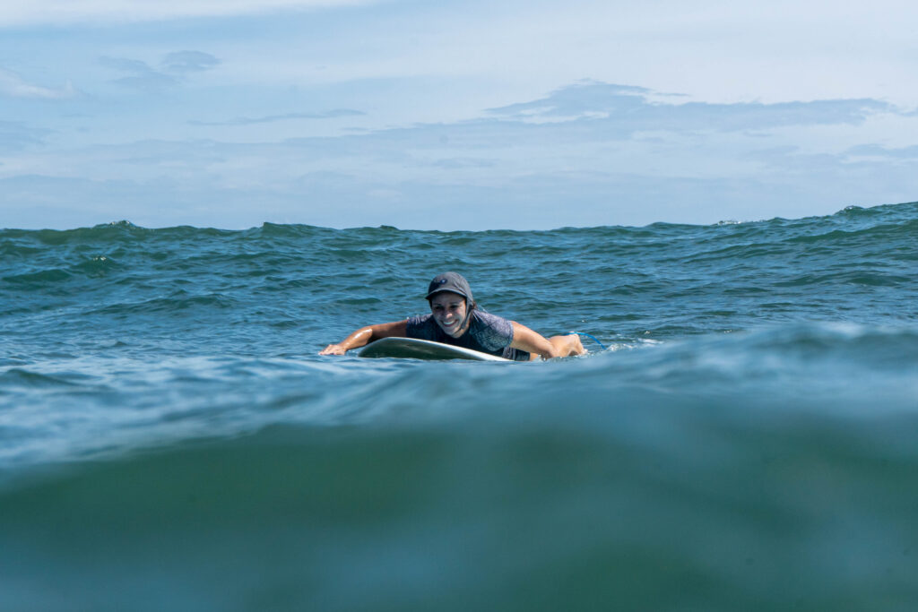 learning how to surf on your own paddling out
