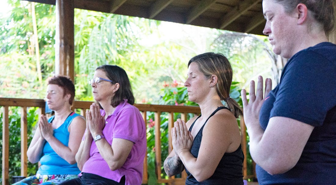 Yoga class using meditation hand gesture