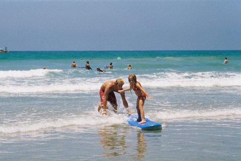 Travis in San Diego Giving Surf Lessons