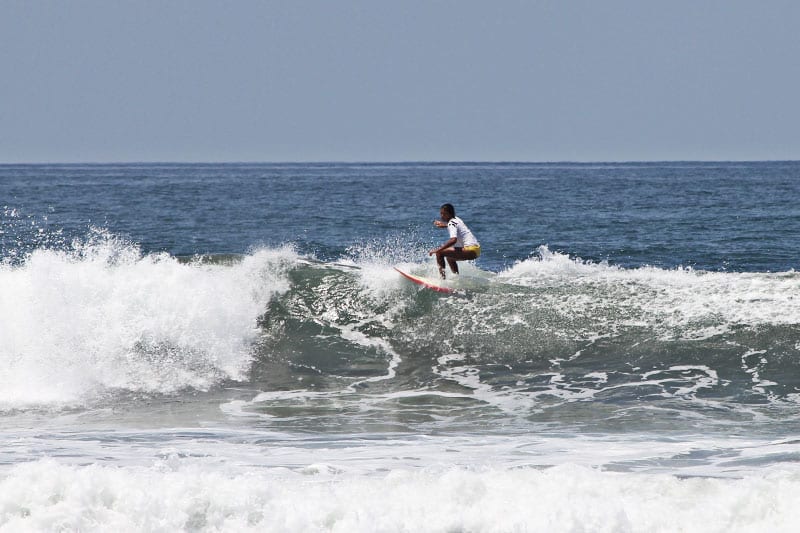 Surfer girl in Dominical