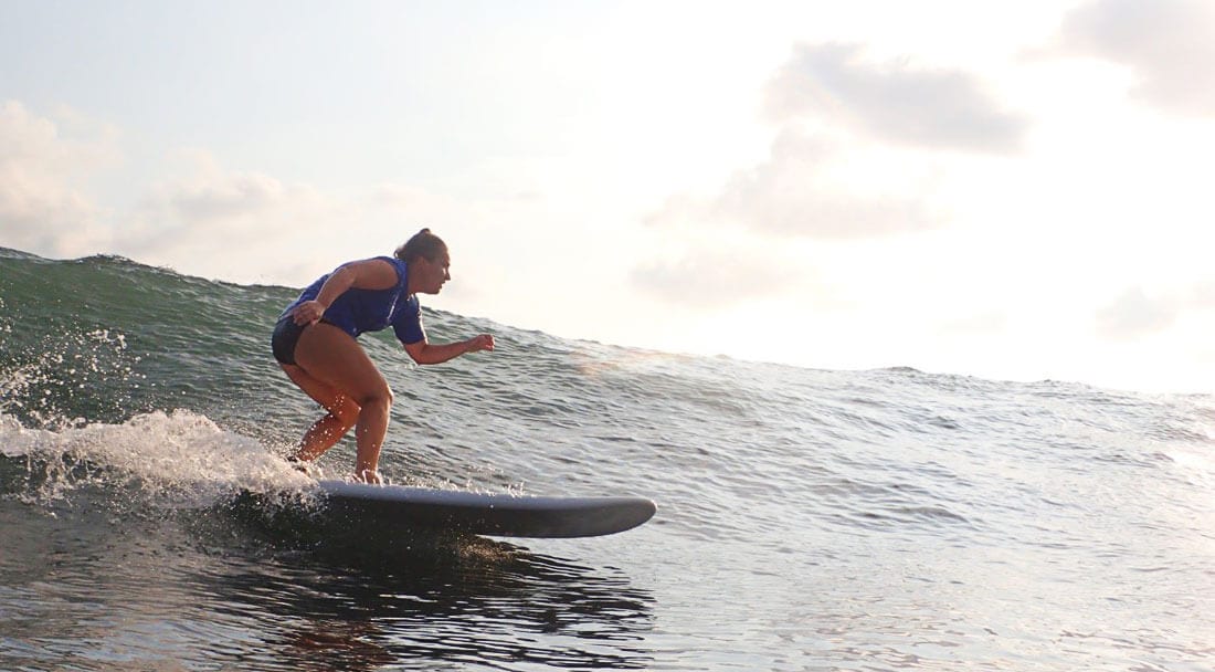 Surfer girl in Bahia Ballena, Costa Rica