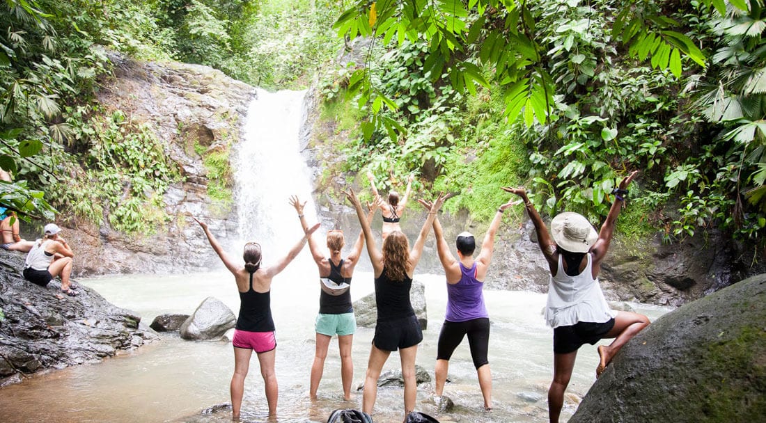 Women at waterfall in Costa Rica
