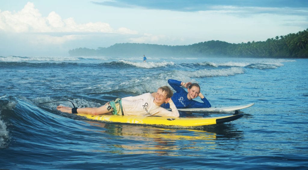 Kids learning to surf with Bodhi Surf + Yoga