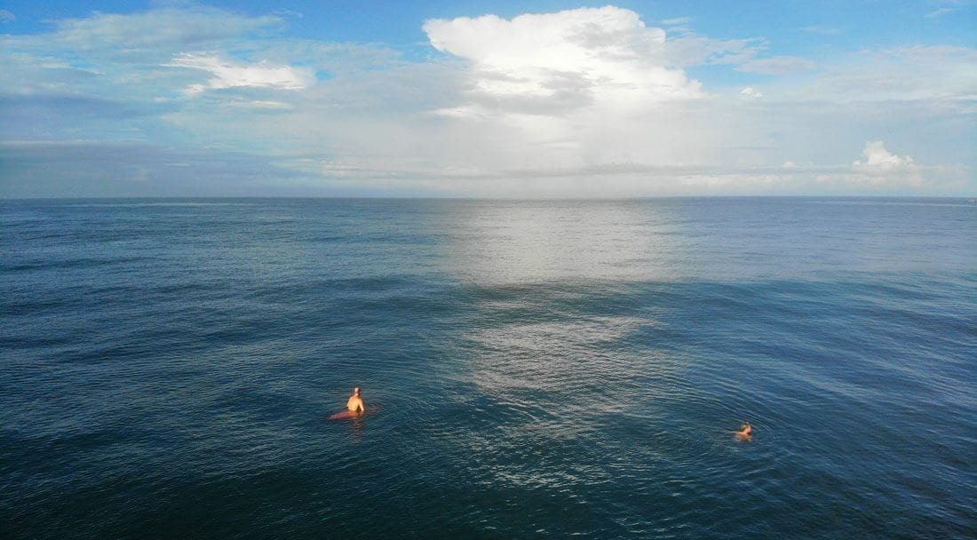 Surfer and bodysurfer in Costa Rica