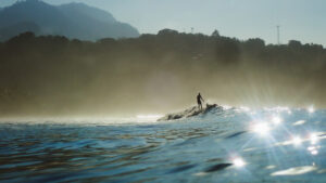 Surfing in the Marino Ballena National Park in the Osa Peninsula, Costa Rica